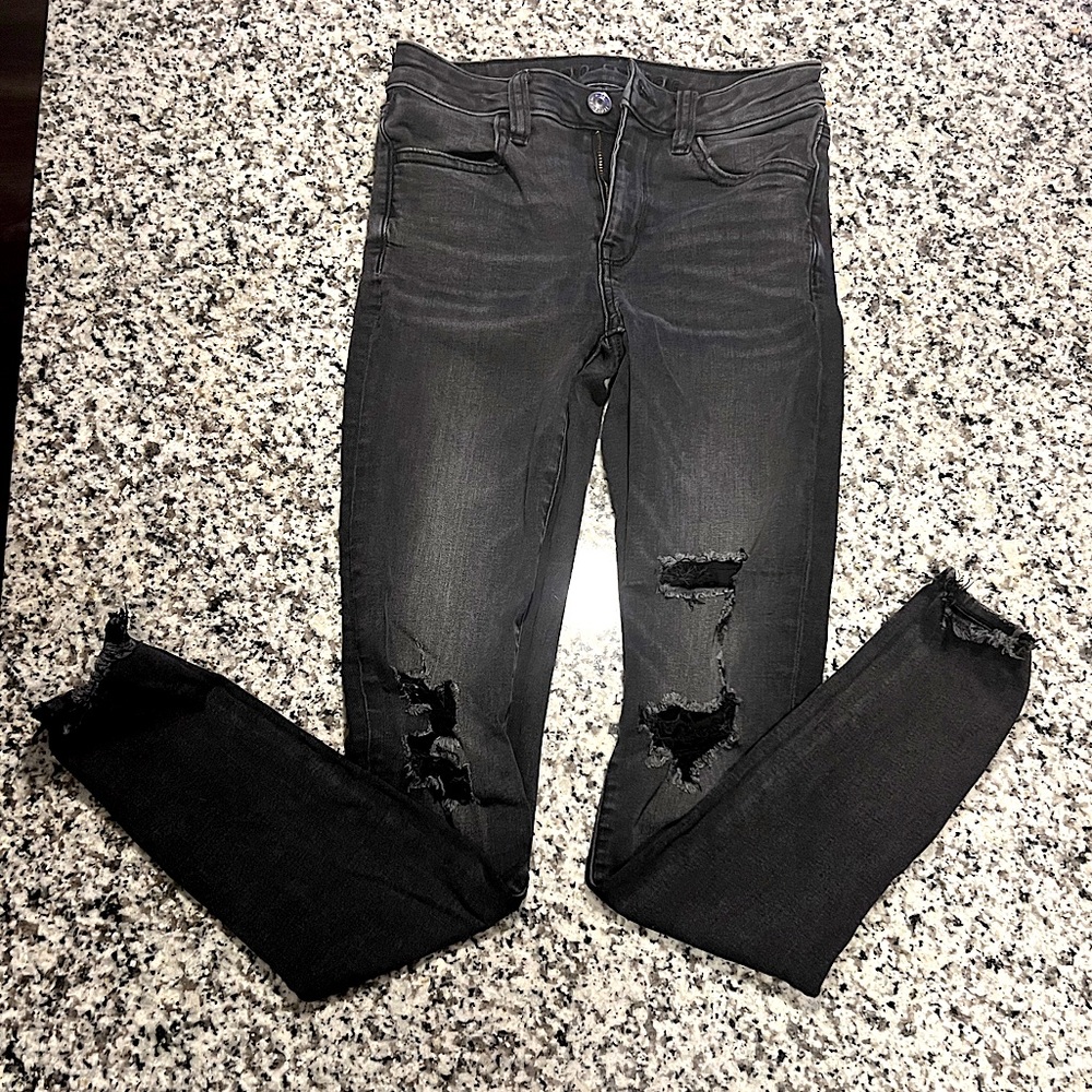 black ripped jeans